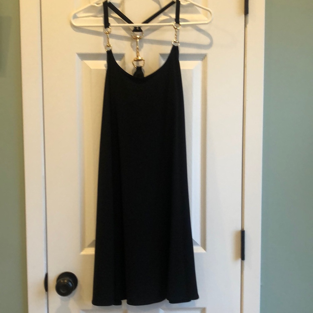 Litlle Black Swing Cocktail Dress with gold hardware accents. Morgan McPheeters